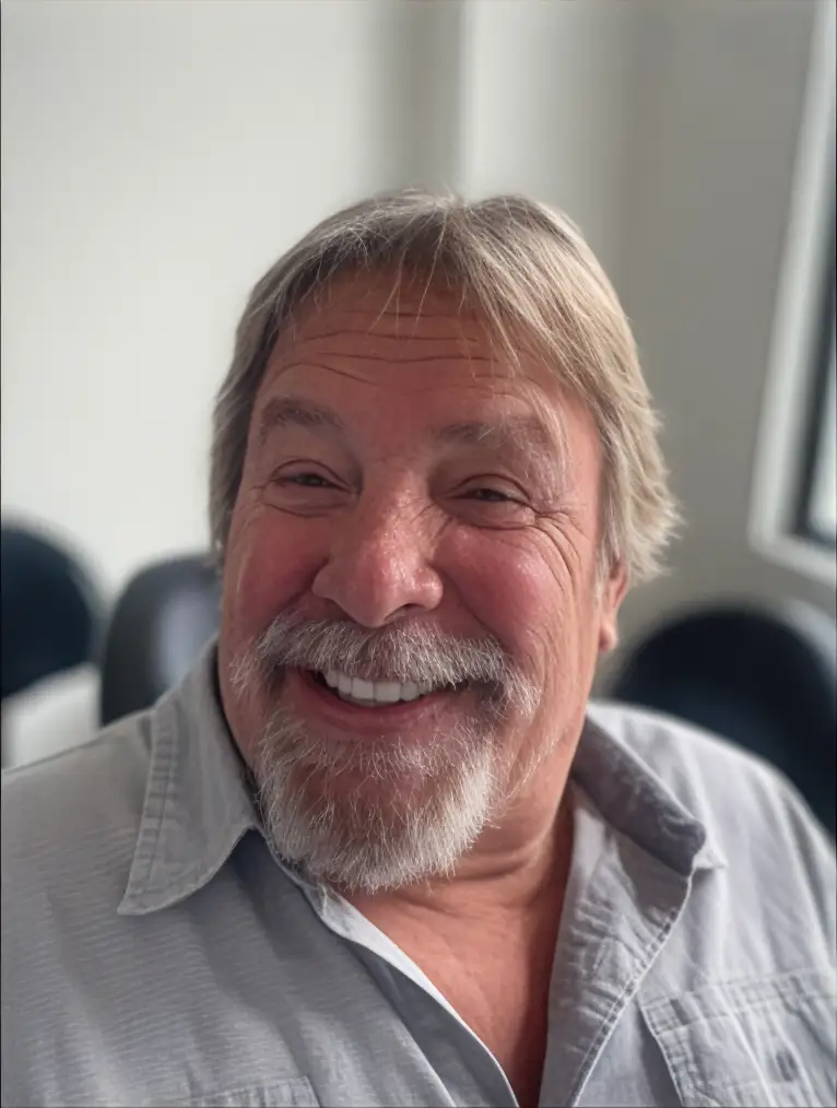Mike smiling after double All On 4 dental implant treatment